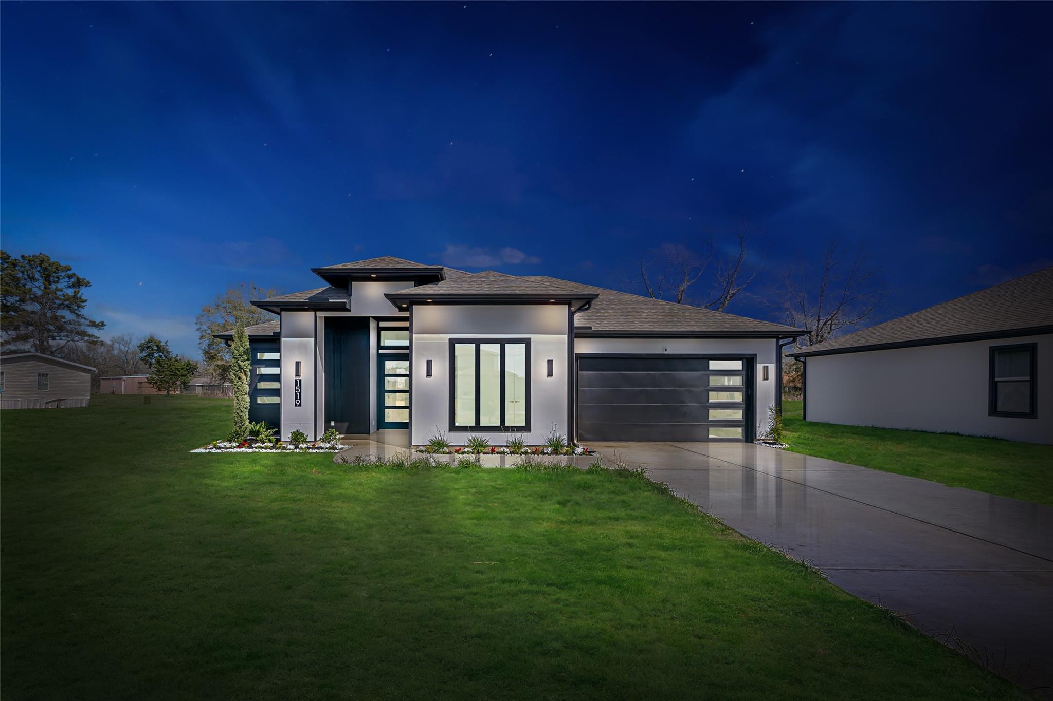 Modern new construction home in Houston at dusk